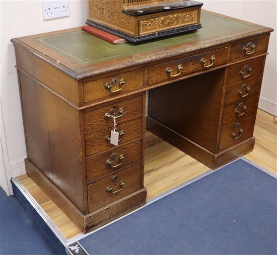 A Victorian oak pedestal desk W.121cm